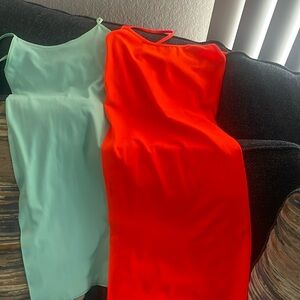 2 bodycon spaghetti strap dresses…great for summer. Never worn!!